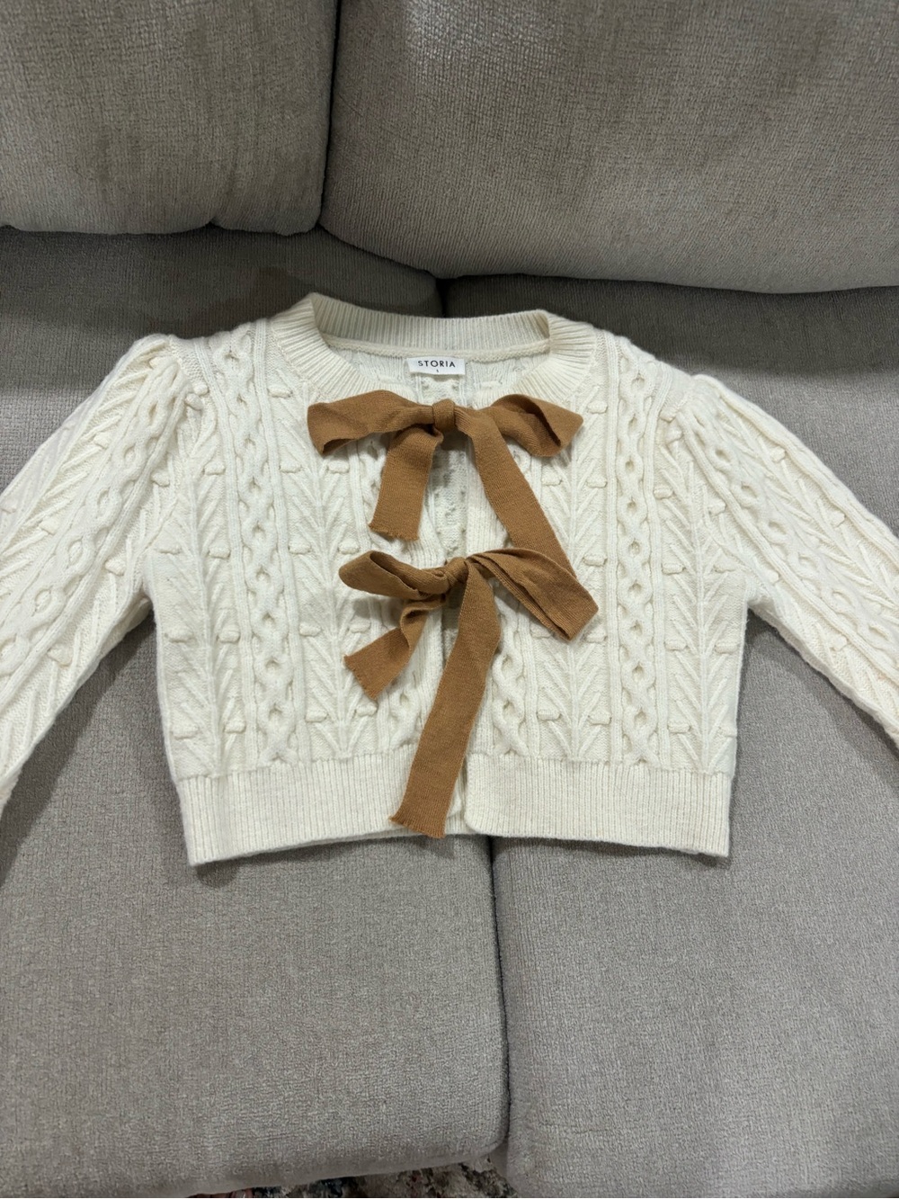Storia Cream Cable-Knit Cropped Cardigan with Brown Ribbon Ties